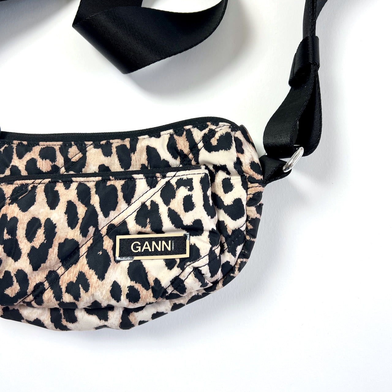 Ganni quilted leopard print baguette bag at Manifesto Woman