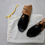 Maison Martin Margiela black & caramel leather flat sandals at Manifesto Woman