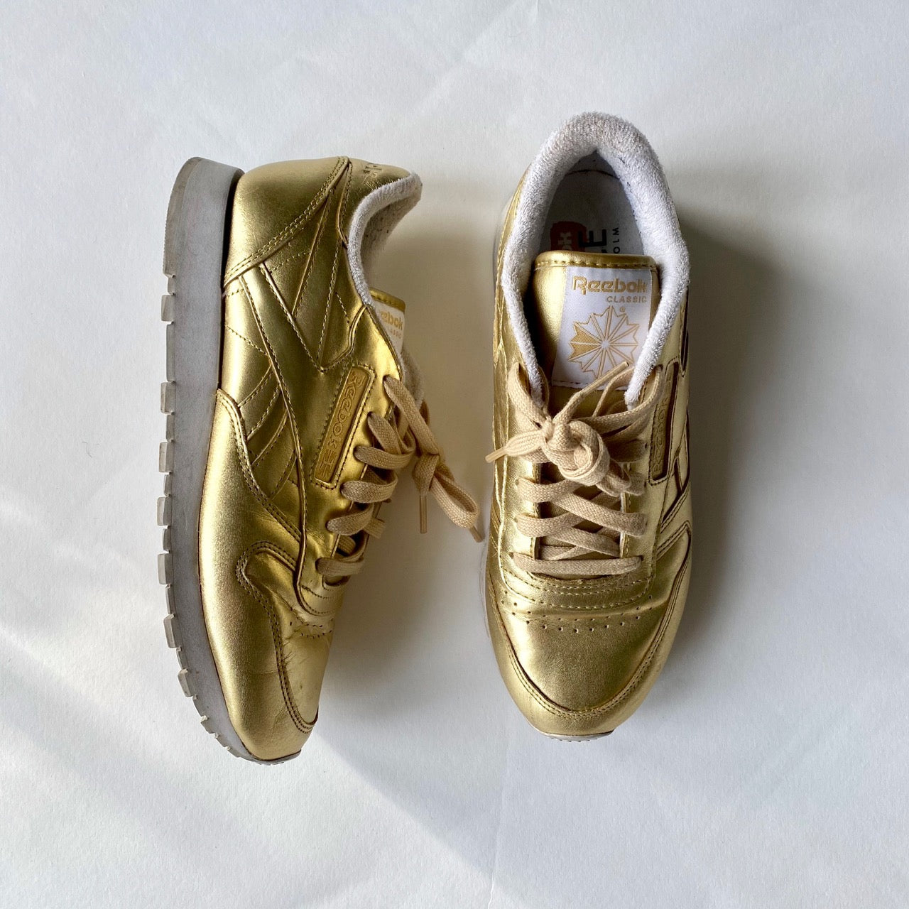 Manifesto Woman Reebok x Face Stockholm gold leather trainers