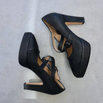 Acne Studios black leather platform heels with cross over straps