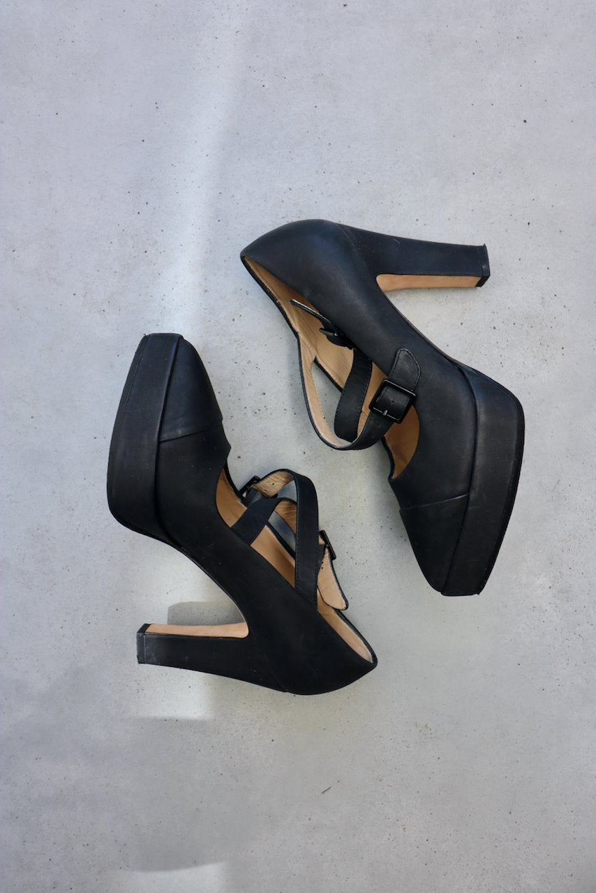 Acne Studios black leather platform heels with cross over straps