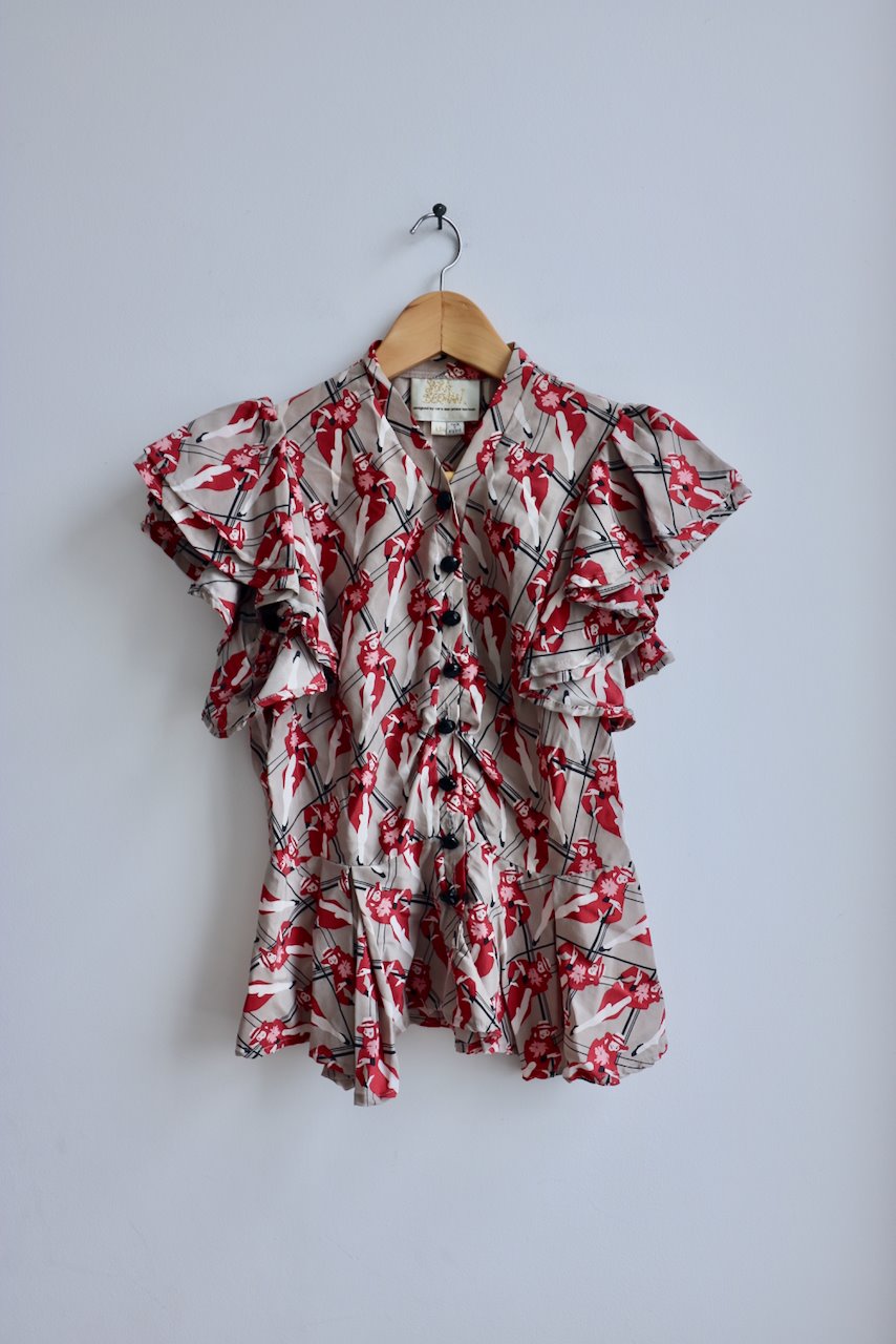 Sara Berman ruffle silk top with lady print at Manifesto Woman